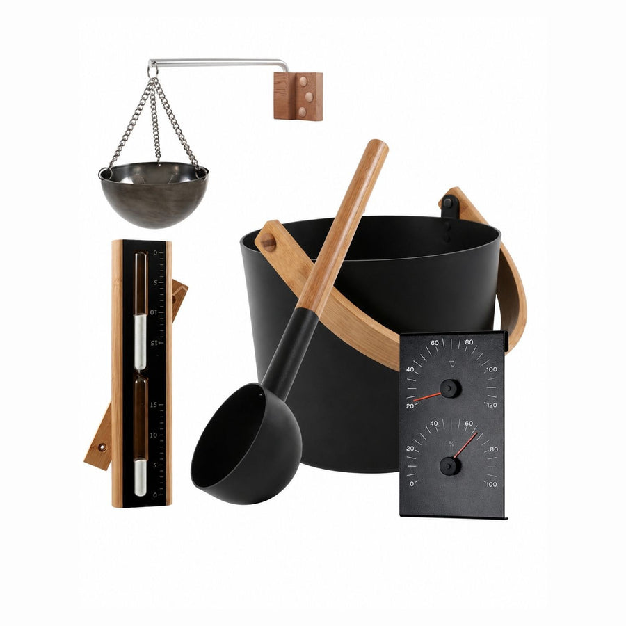 Procraft five-piece sauna accessory kit in black with bamboo trim: bucket and ladle, 15-minute sand timer, thermometer and hygrometer gauge, and a hanging bowl on a wall bracket